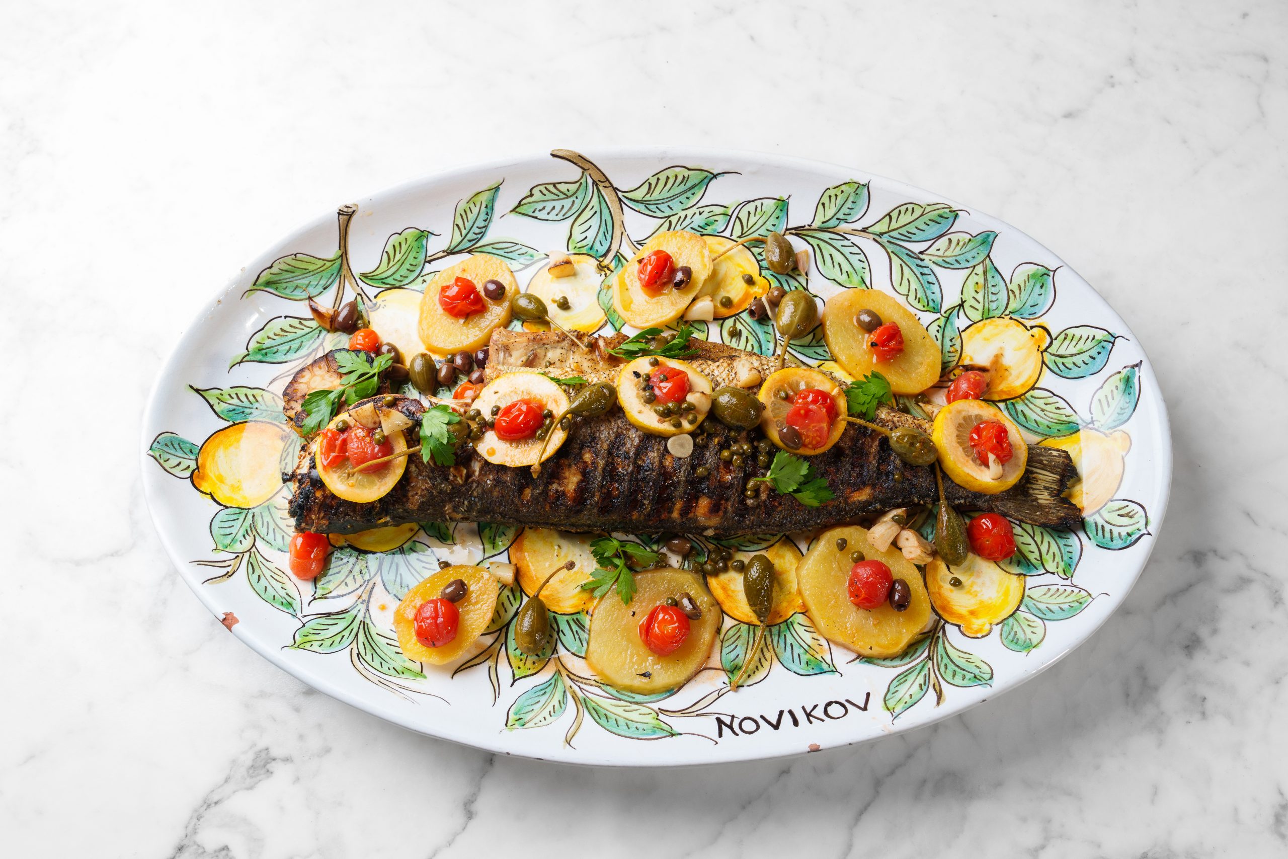 Sea Bass Wood Oven Roasted or Grilled, Potatoes, Tomatoes, Olive & Capers