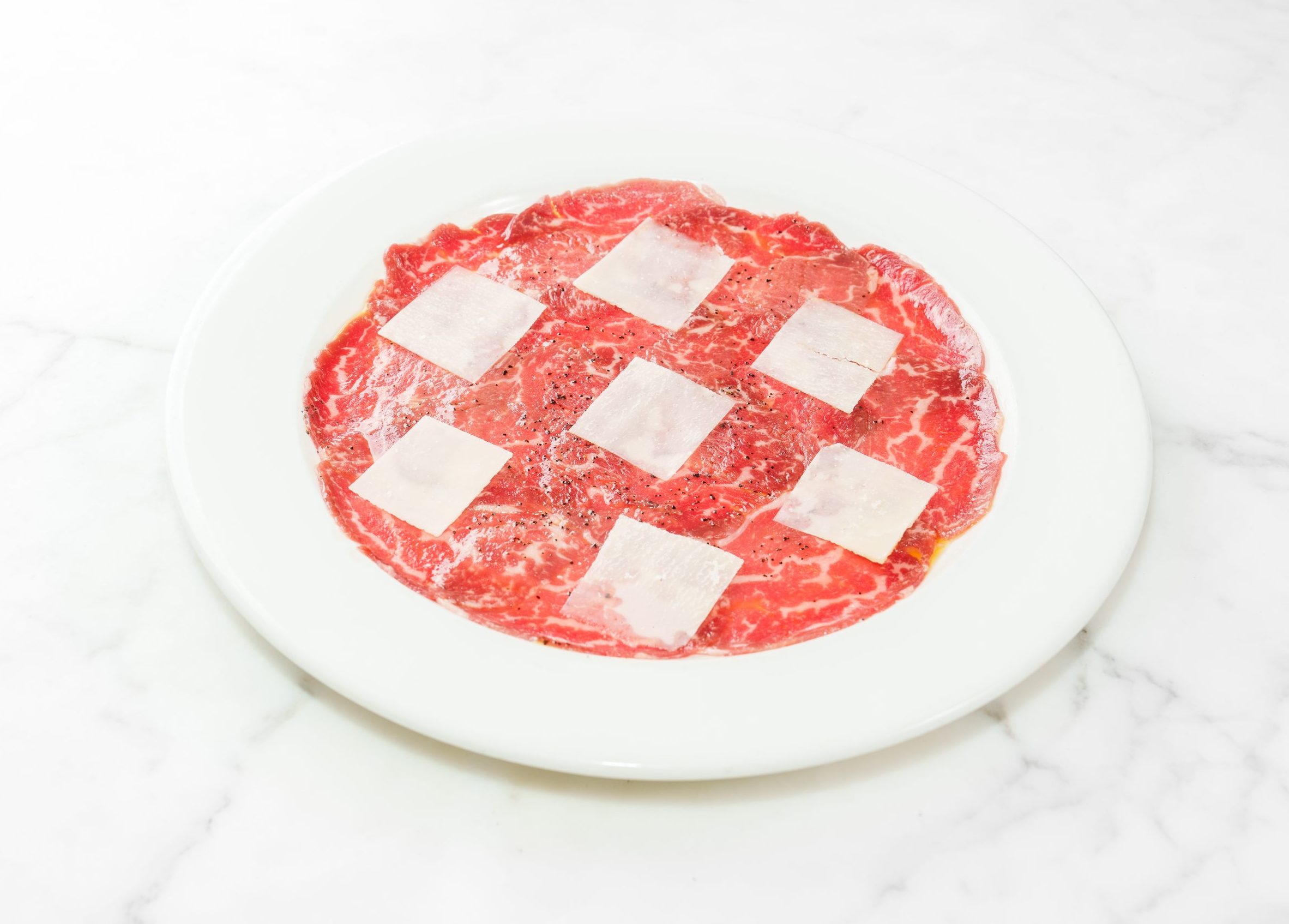 Beef Carpaccio, Parmesan Cheese & Rocket Salad
