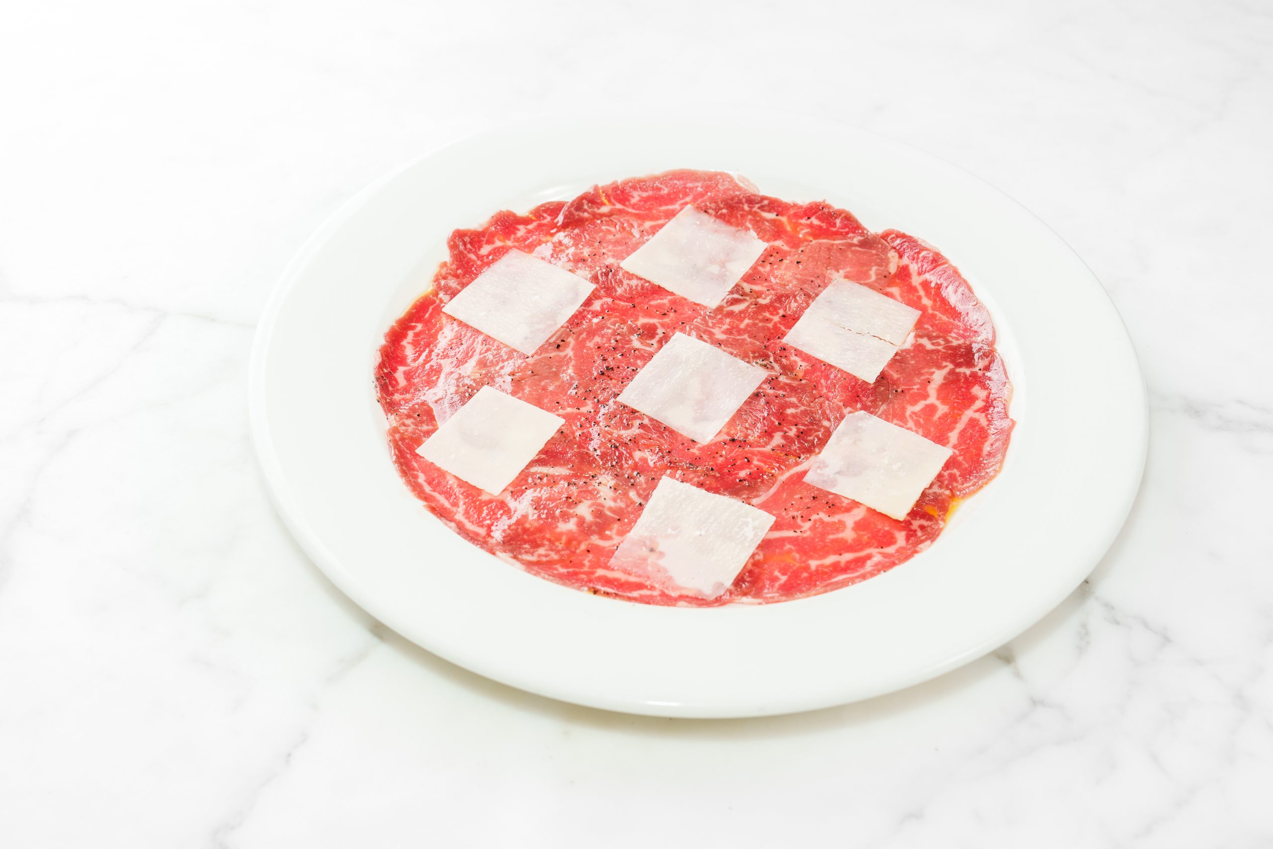 Beef Carpaccio, Parmesan Cheese & Rocket Salad